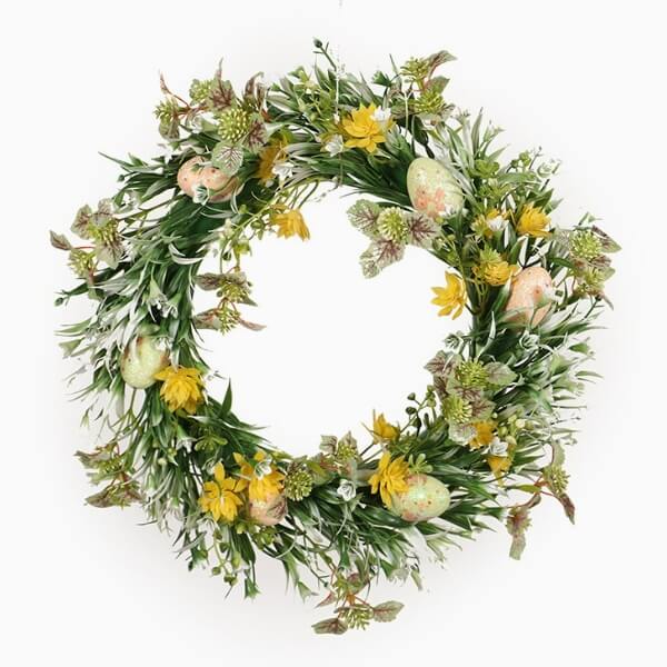 Handmade green Easter egg wreath with daisies and eucalyptus leaves